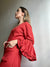 Vestido terracota con mangas en campanas y diseños estilo rosas caida libre