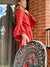 Laterales del vestido terracota largo con rosas en las mangas para un look  casual