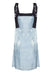 Vestido corto con destellos de brillo. Estilo bata azul celeste 